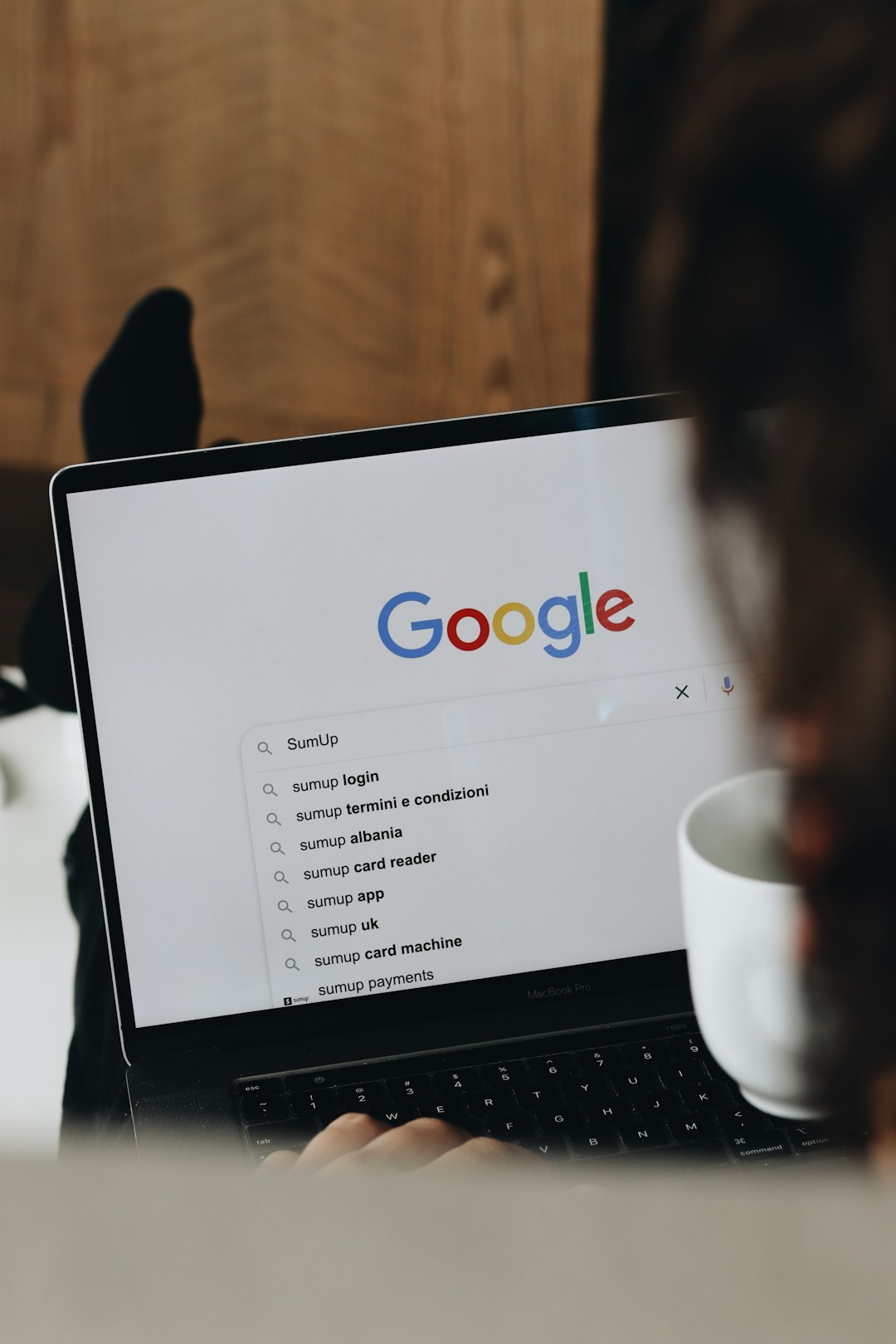 a-person-sitting-in-front-of-a-laptop-computer-n8snv9cy37q